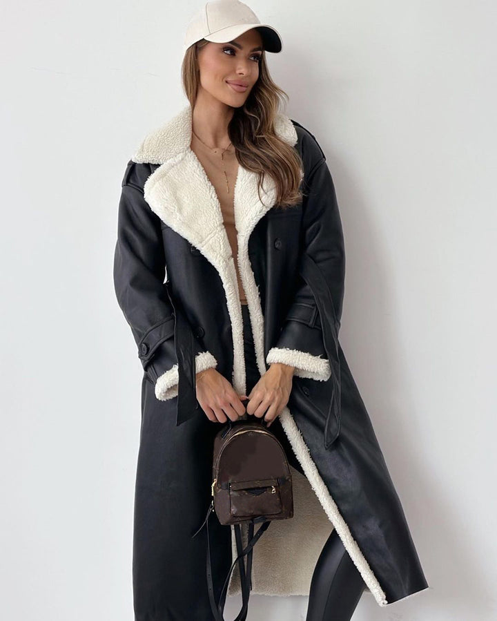 Woman in a long double-breasted belted coat