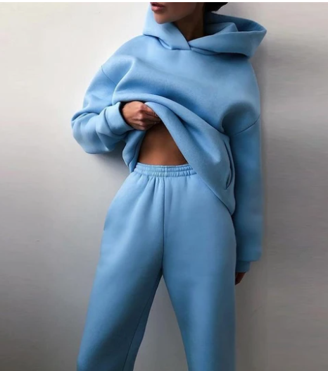 Woman in a hoodie and joggers tracksuit
