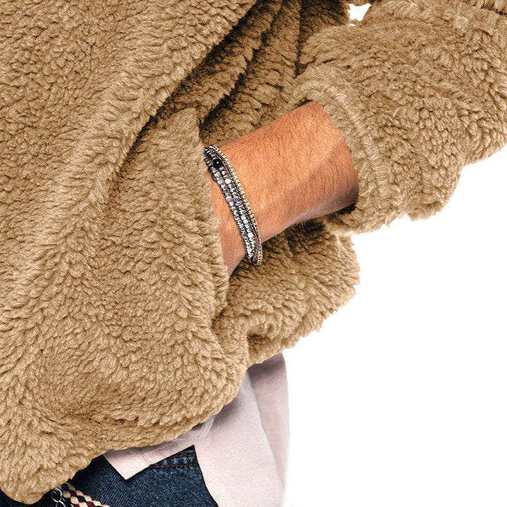 Man in a teddy fleece hooded jacket
