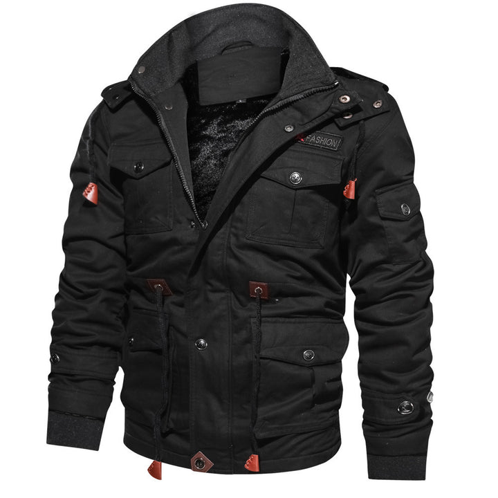 Man wearing a hooded military-style jacket