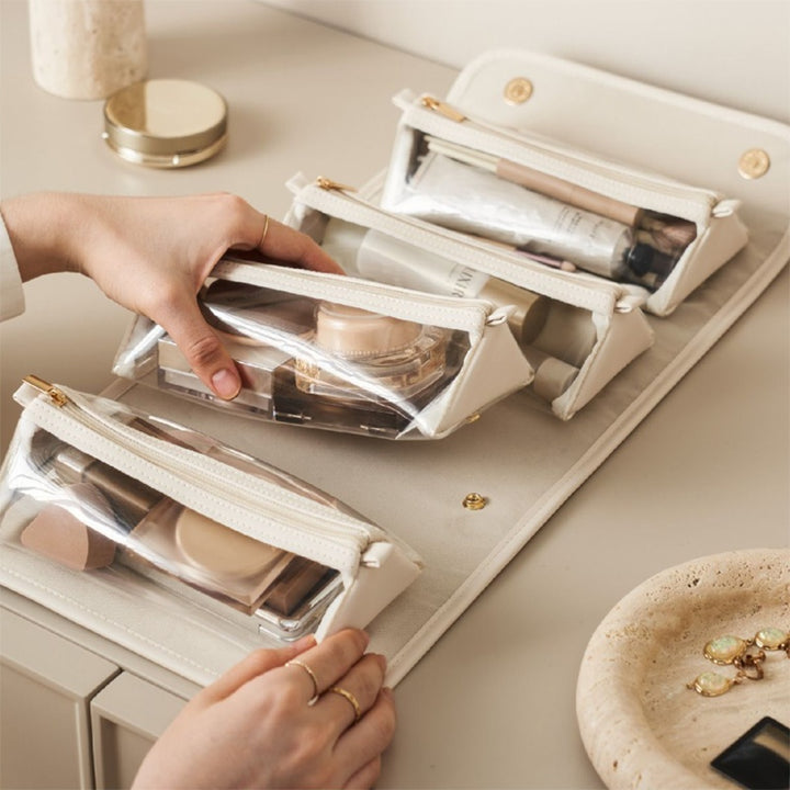 Foldable travel toiletry bag with clear pouches