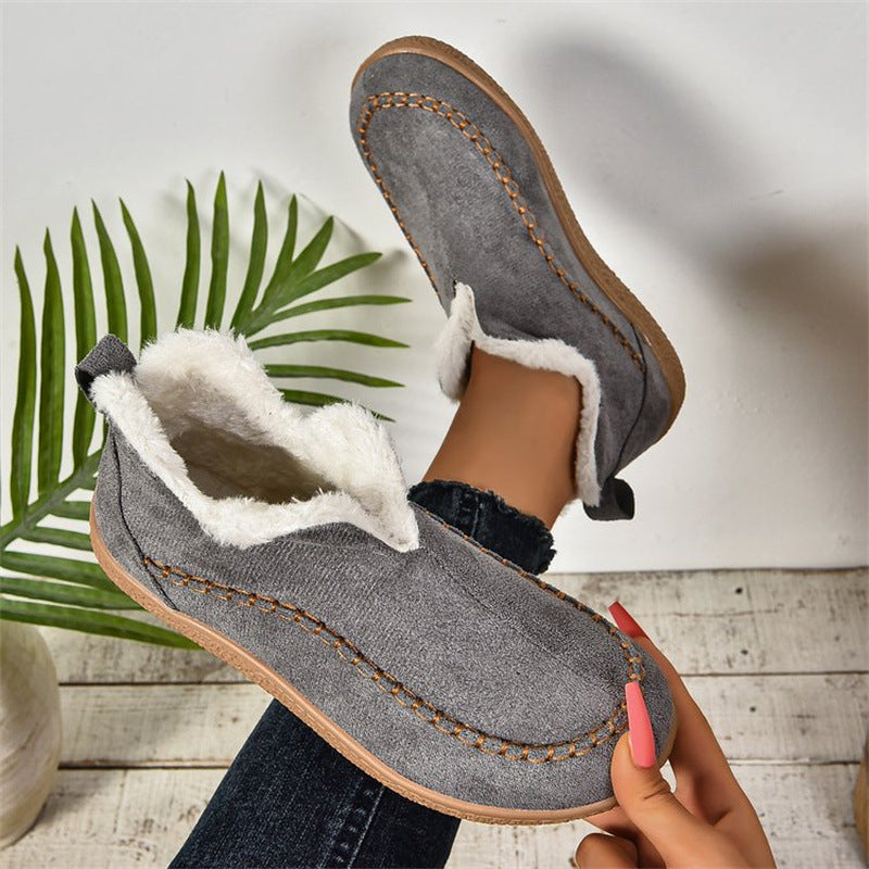 Flat faux suede ankle boots with V-cut