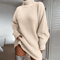 Woman in oversized roll neck jumper dress