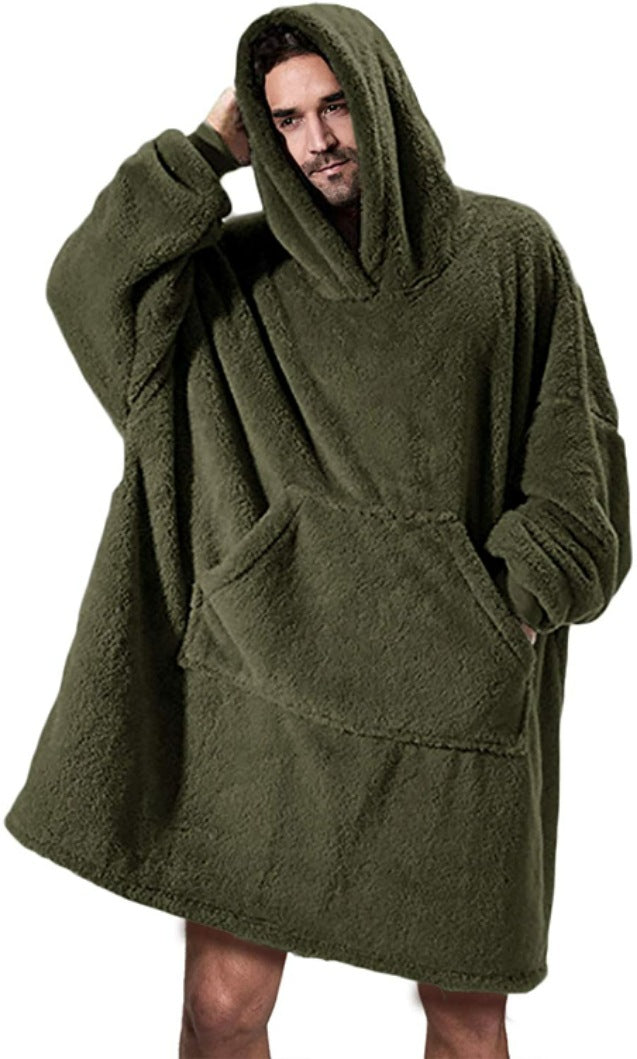 Person relaxing in an oversized blanket hoodie
