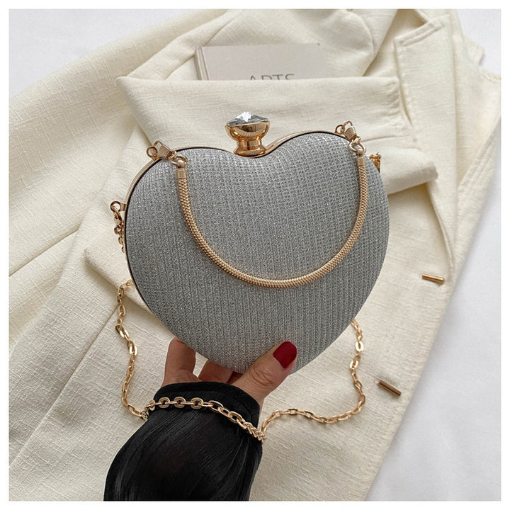 Heart-shaped evening clutch with chain