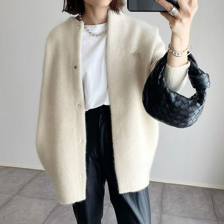 Woman in long fuzzy knit cardigan