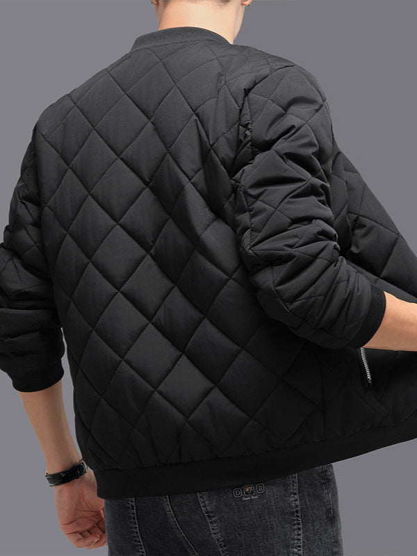 Man wearing a diamond quilted bomber jacket