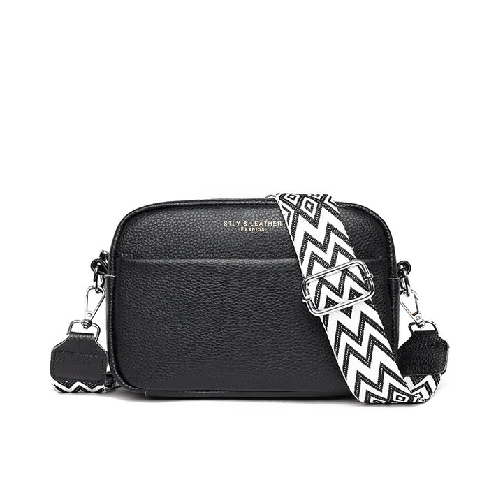 Millie | Small leather crossbody bag with wide strap