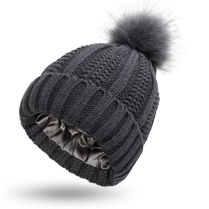 Chunky knit beanie with faux fur pom pom