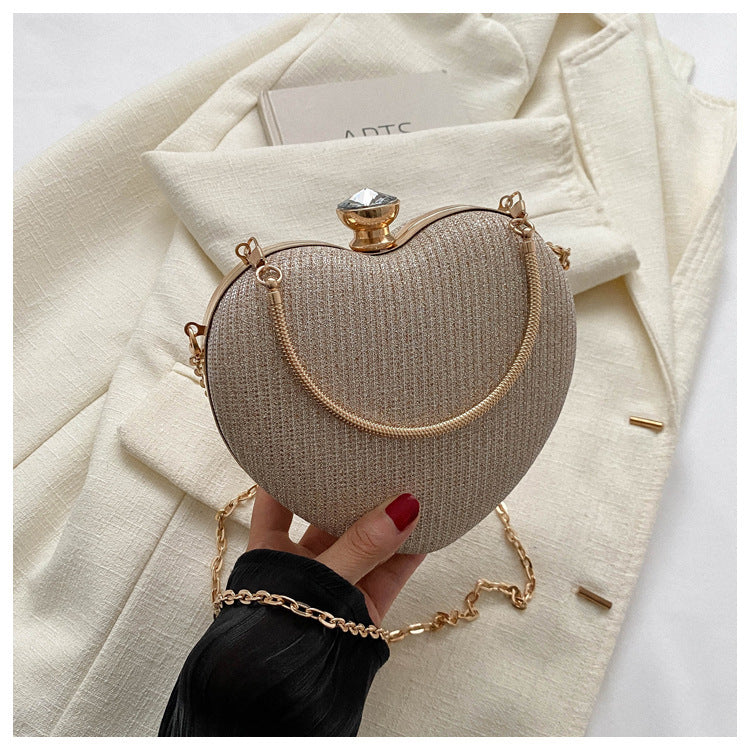 Heart-shaped evening clutch with chain