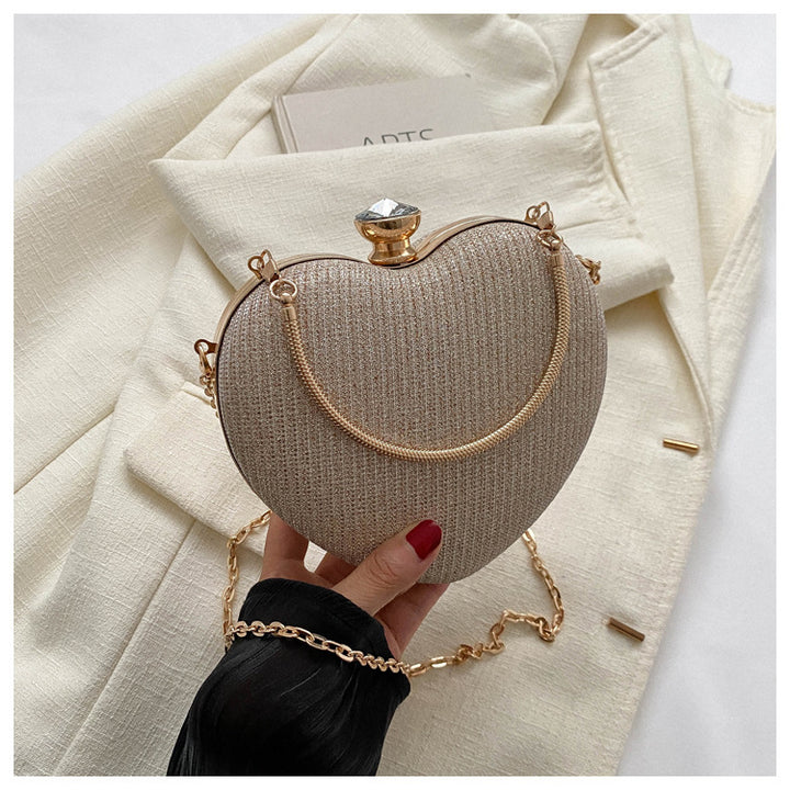 Heart-shaped evening clutch with chain
