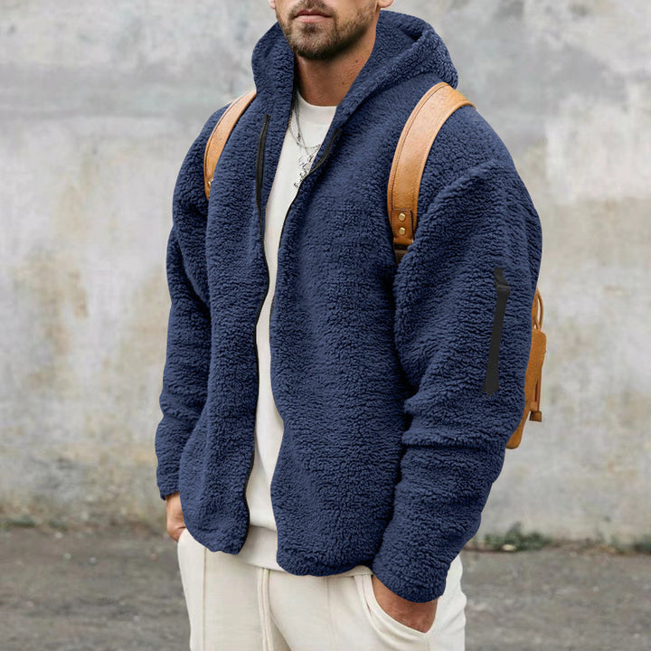 Man in a teddy fleece hooded jacket
