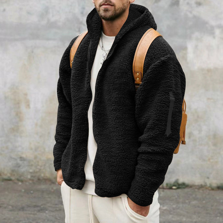 Man in a teddy fleece hooded jacket