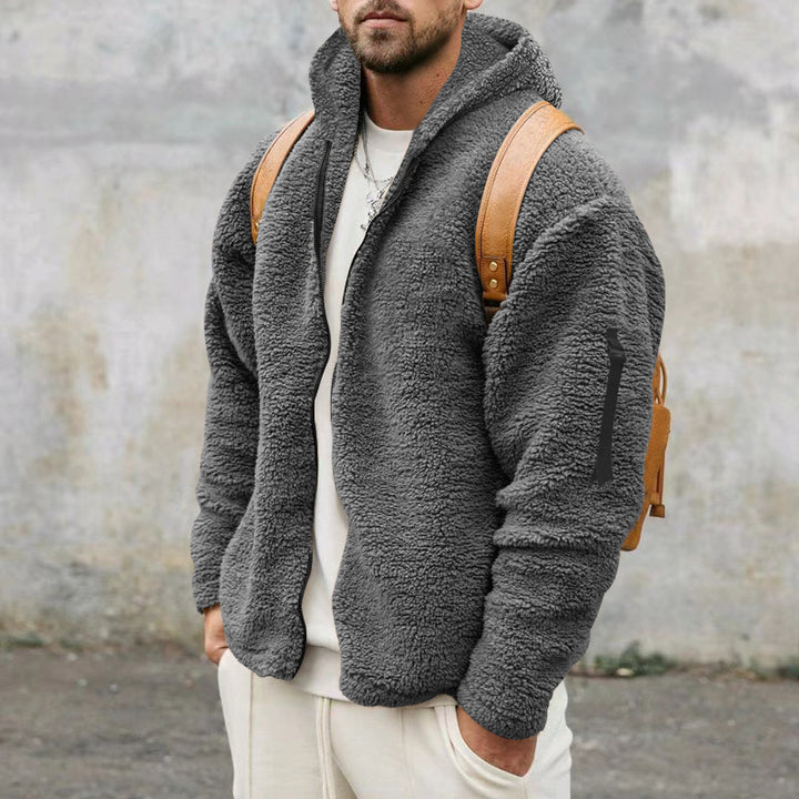 Man in a teddy fleece hooded jacket