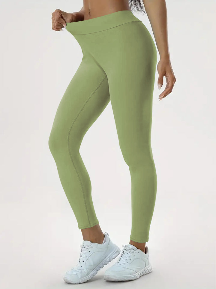 Woman in high-waisted scrunch bum leggings