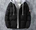 Man wearing a hooded puffer jacket