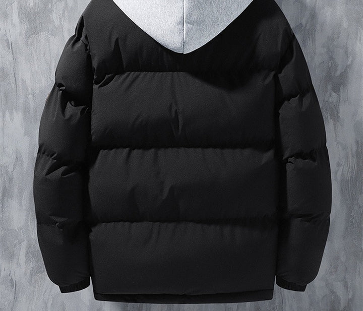 Man wearing a hooded puffer jacket