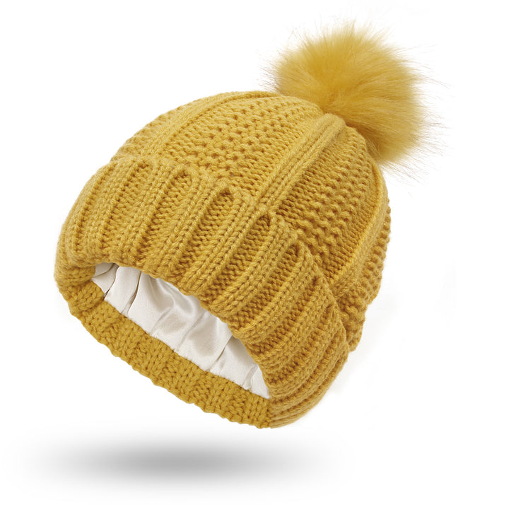 Chunky knit beanie with faux fur pom pom