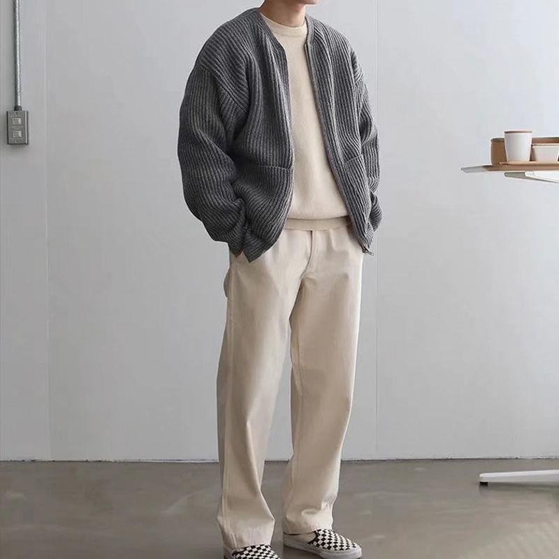 Man wearing a chunky rib knit zip cardigan