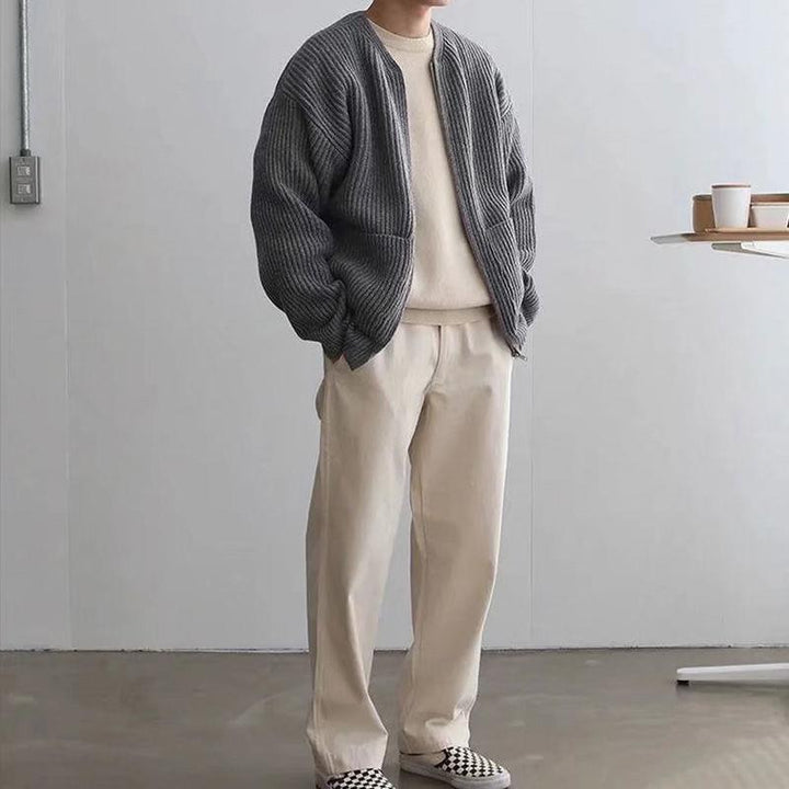Man wearing a chunky rib knit zip cardigan