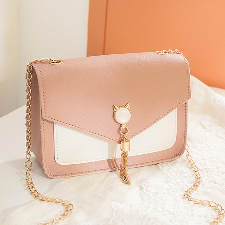 Small square crossbody bag with cat clasp