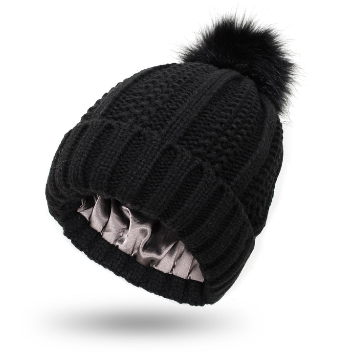 Chunky knit beanie with faux fur pom pom