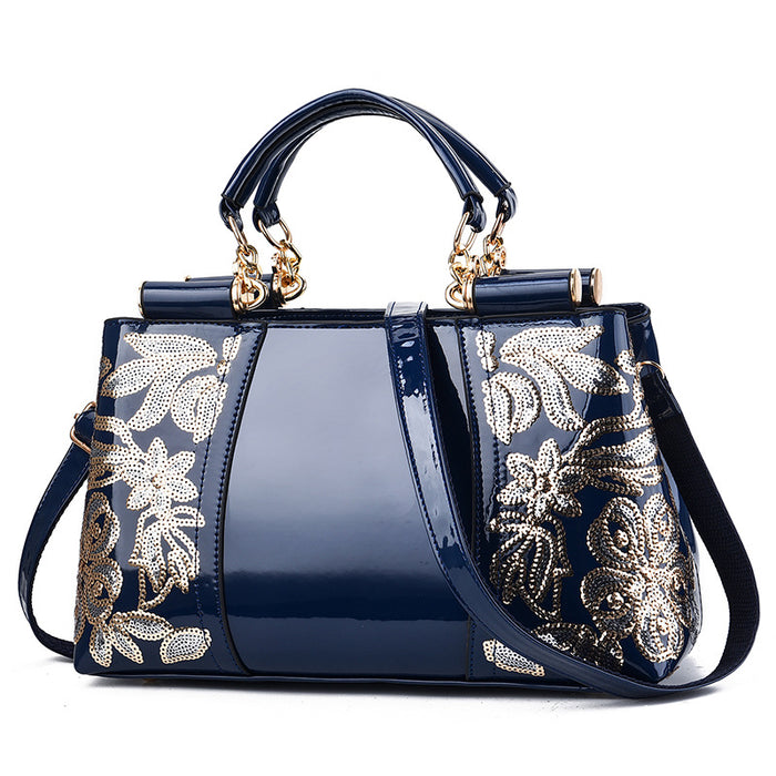 Isla | Sequin embroidered patent handbag for parties