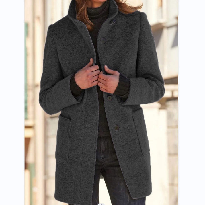 Woman wearing stand collar wool-look coat