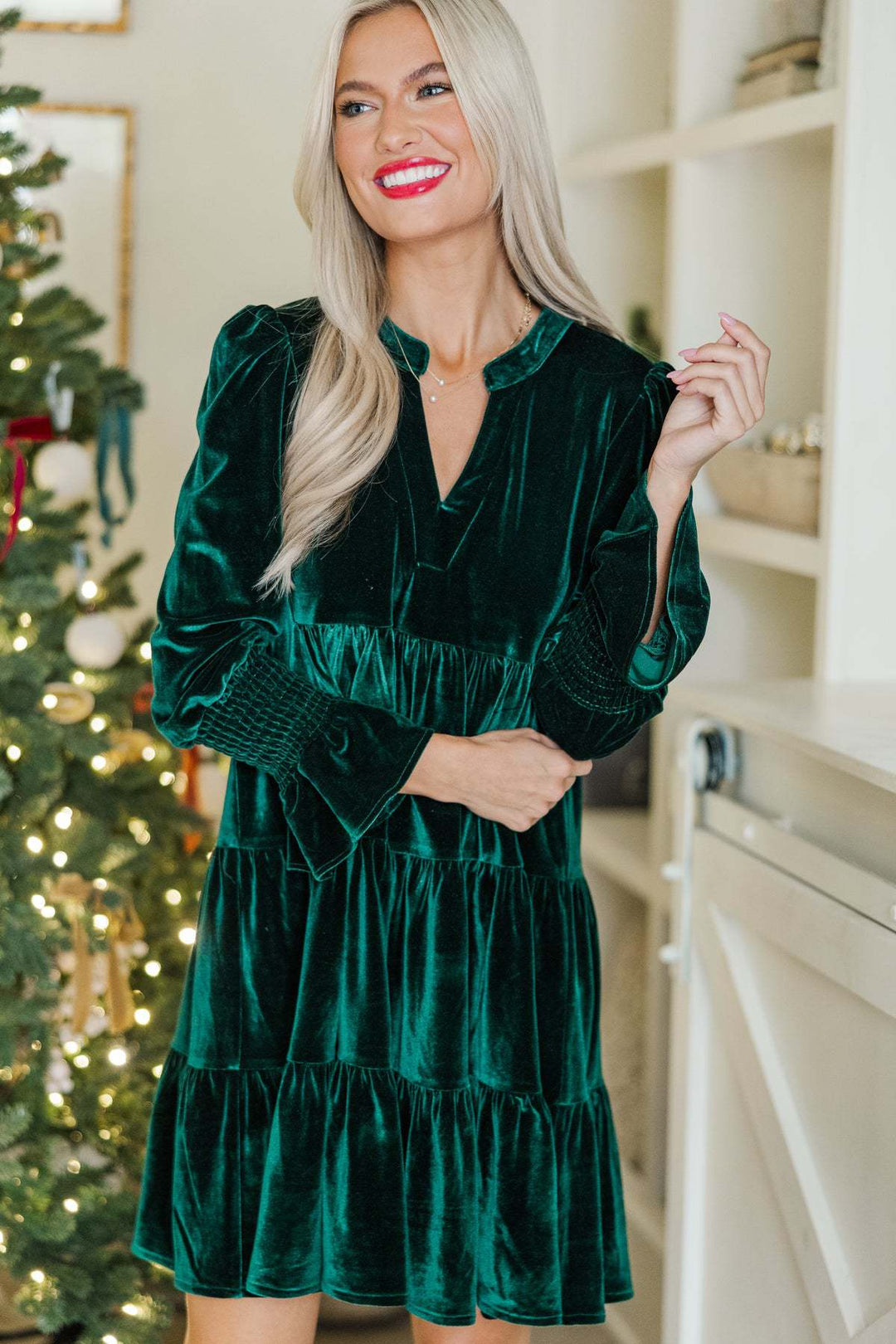 Woman in a velvet tiered mini dress
