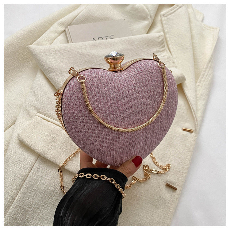Heart-shaped evening clutch with chain
