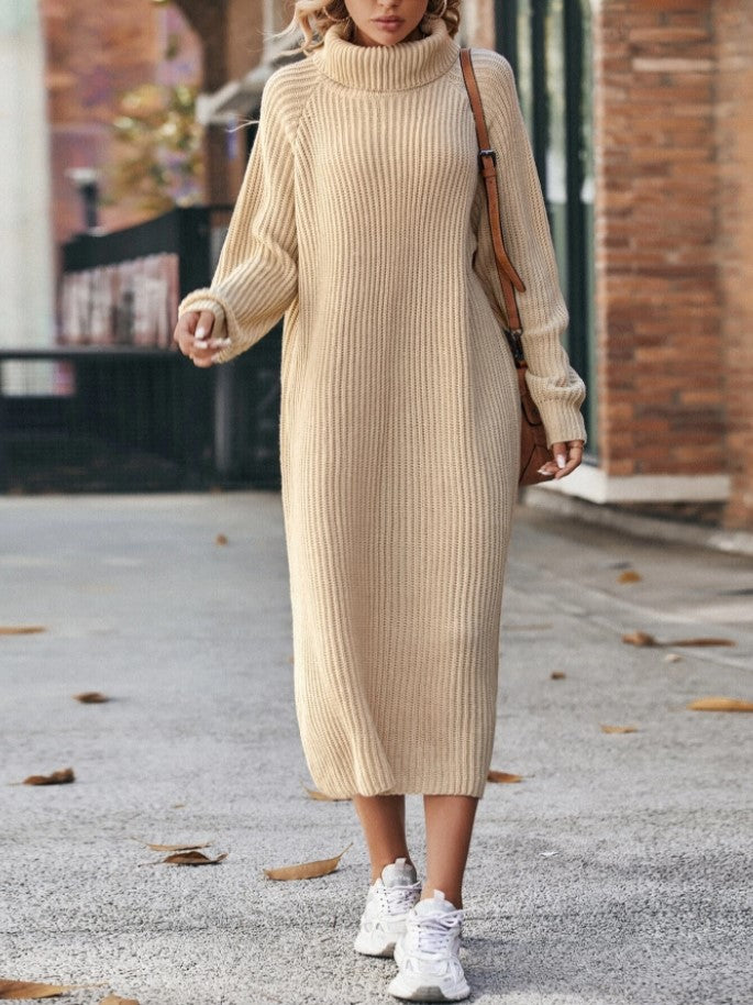 Woman in a long roll neck jumper dress