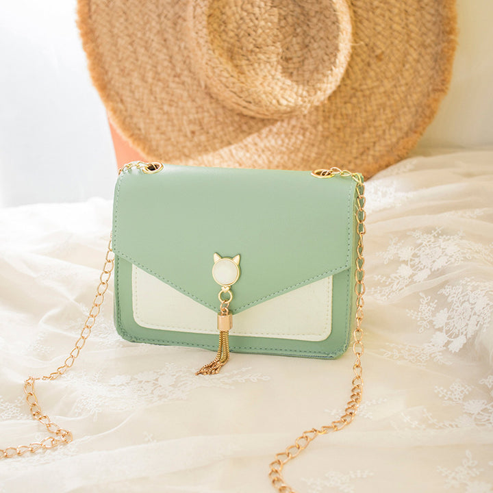 Small square crossbody bag with cat clasp