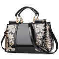 Sequin embroidered patent evening handbag
