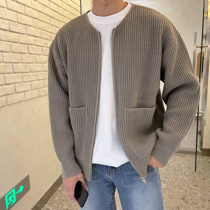 Man wearing a chunky rib knit zip cardigan
