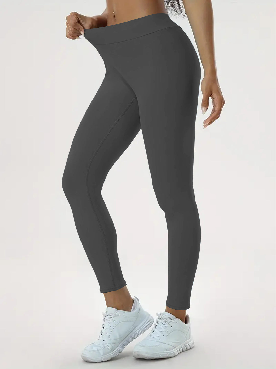 Woman in high-waisted scrunch bum leggings